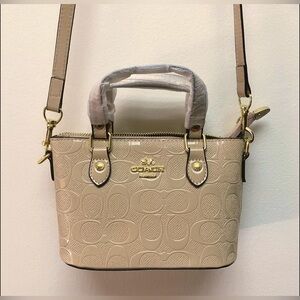 Coach Beige Patent Leather Mini Bag crossbody strap
